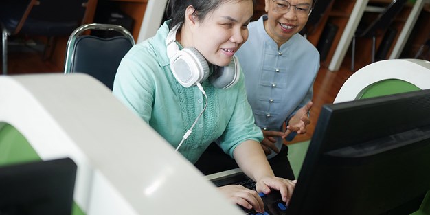 A blind computer user, photo.